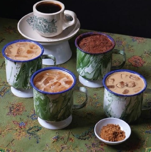Traditional kopi served in enamel cups
